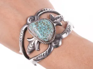 6.5" Vintage Navajo Tufa cast silver bracelet with turquoise