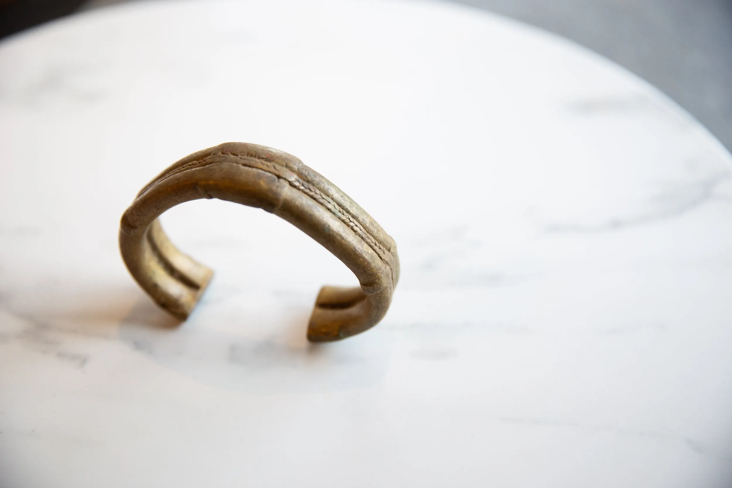 Antique African Bronze Striped Design Cuff Bracelet with Golden Patina