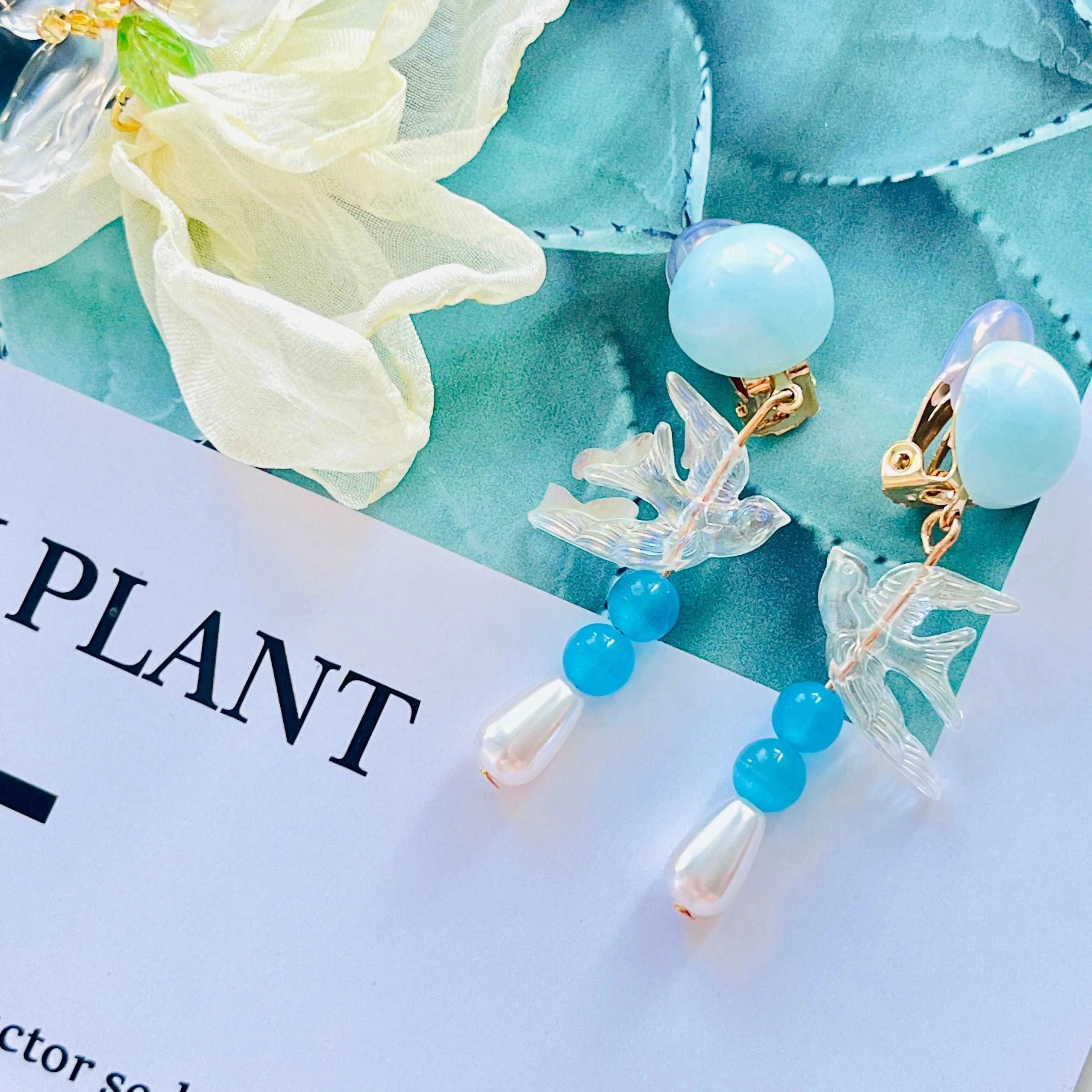 Clear Blue Swallow Pearl Clip-On Earrings