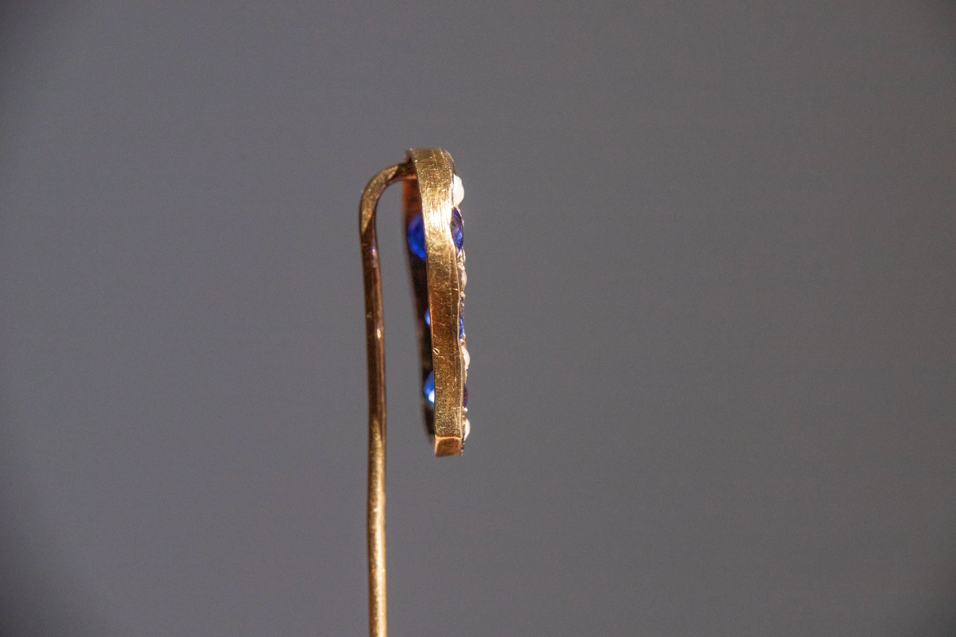 Early Victorian High Karat Gold 0.78 CTW Cornflower Spinel & Seed Pearl Horseshoe Stick Pin