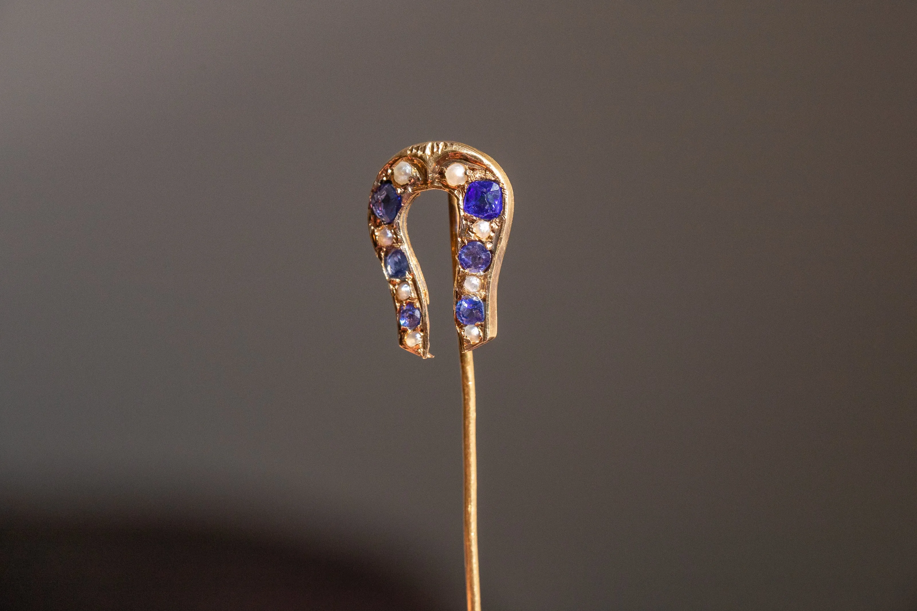 Early Victorian High Karat Gold 0.78 CTW Cornflower Spinel & Seed Pearl Horseshoe Stick Pin