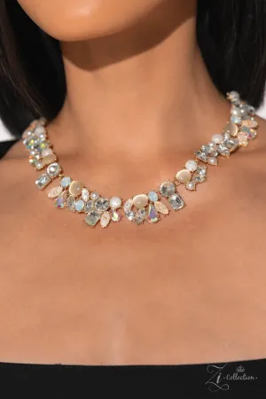 Enchanting - 2023 Zi Collection - Gold with White and Iridescent Gem and Cat's Eye Stone Paparazzi Short Statement Necklace