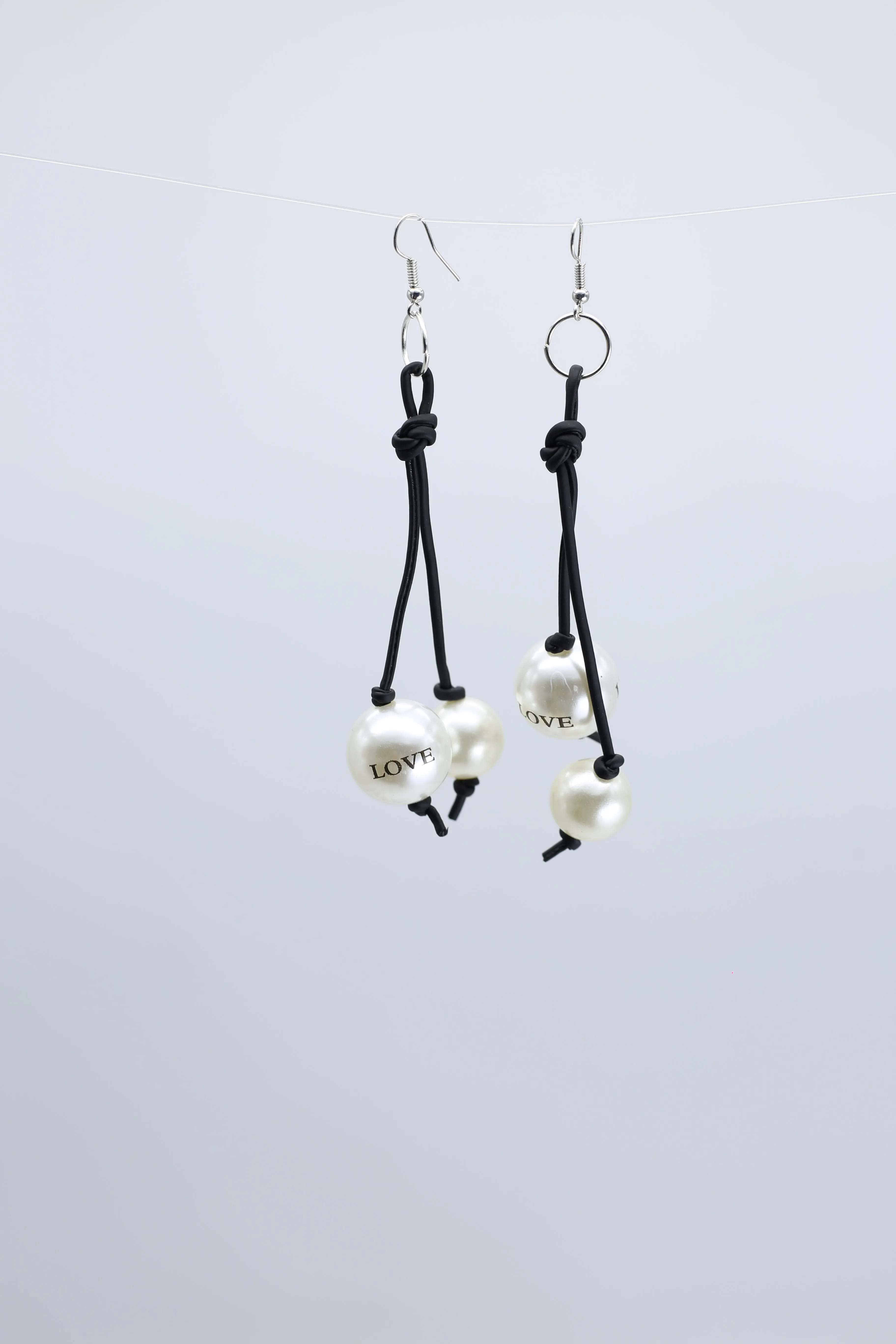 Faux Pearl "Love" on 2 Leatherette Strands Earrings - White