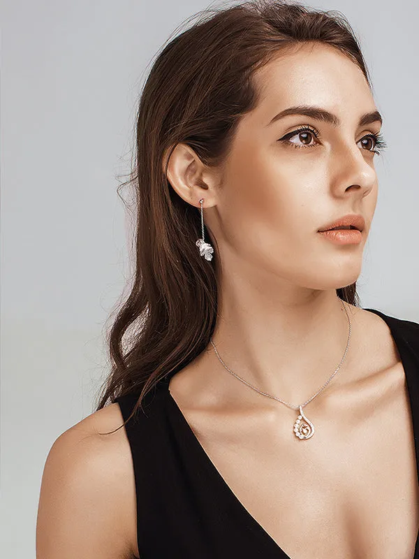 Leaf Pattern Asymmetric Pearl Earrings