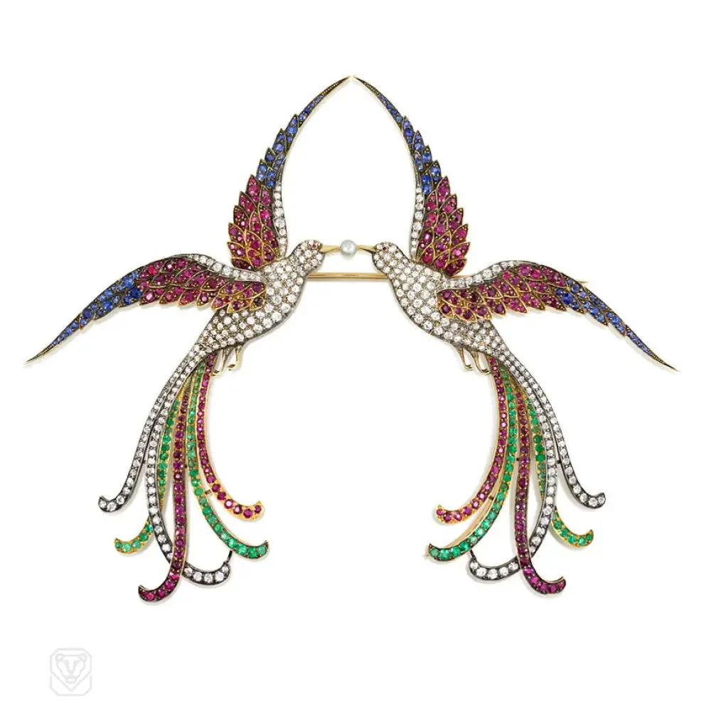 Pair of superb antique bird brooches