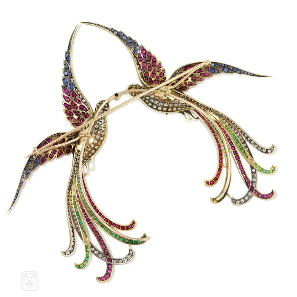 Pair of superb antique bird brooches