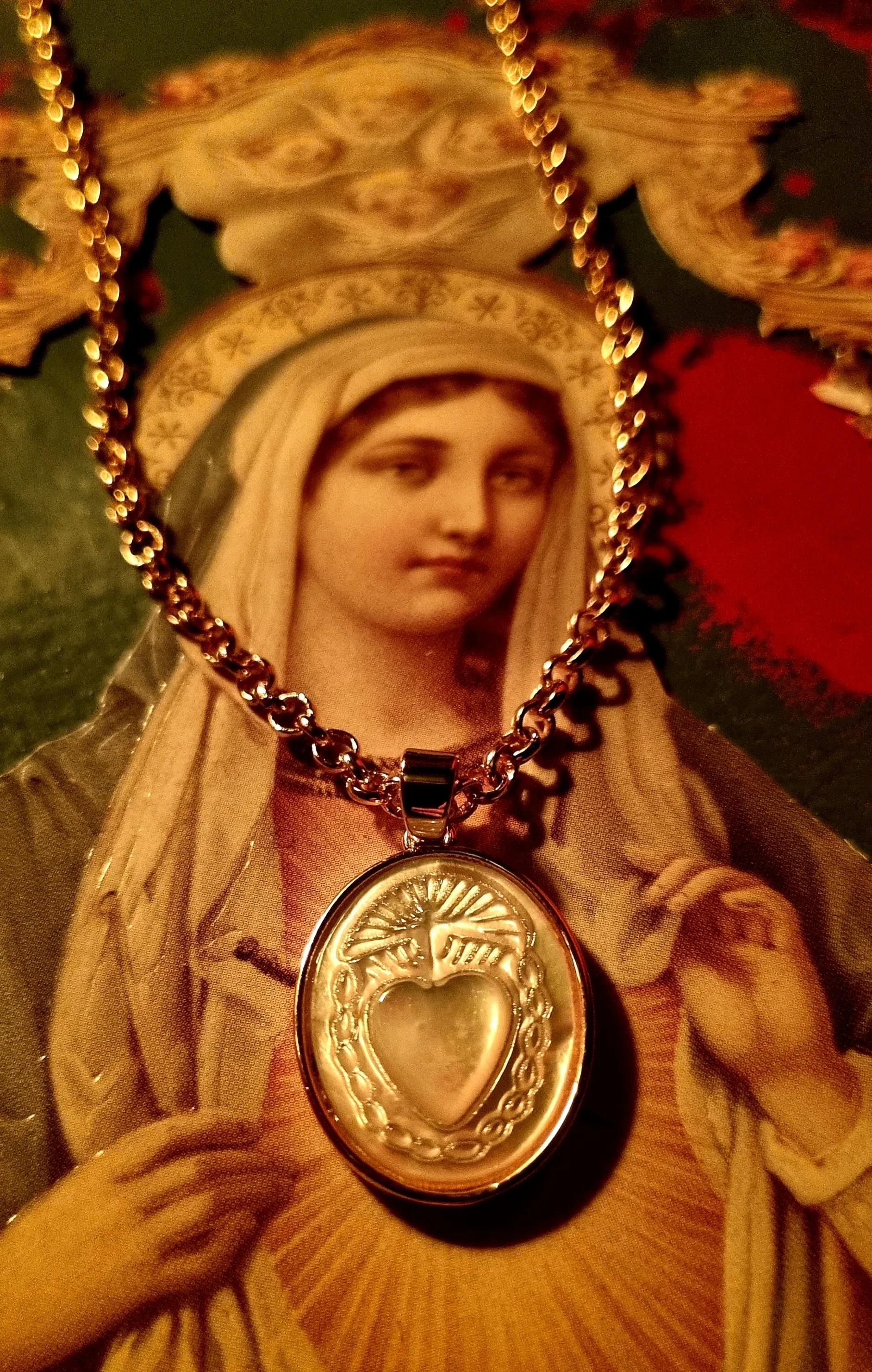 Sacred heart carved mother of pearl earrings and necklace