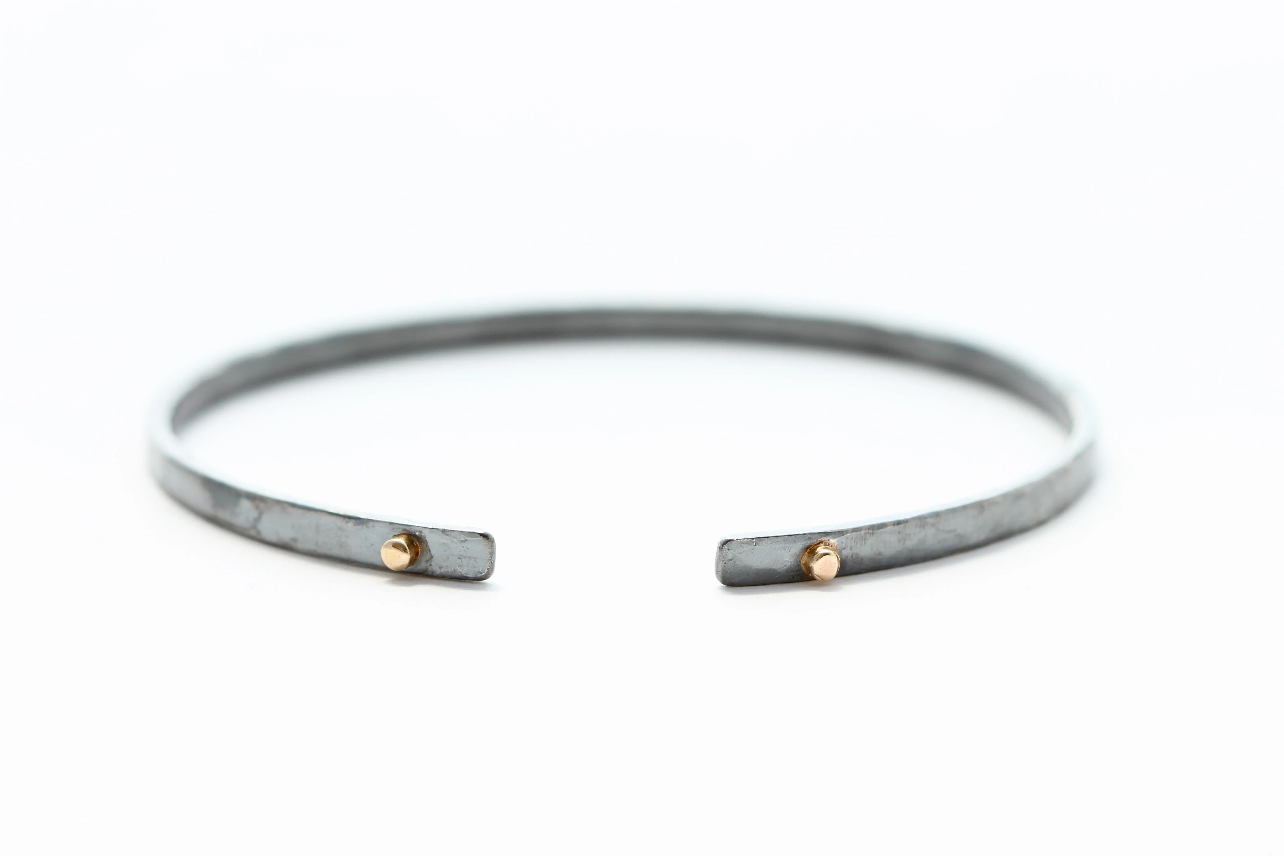 thin Oxidized sterling silver bracelet with five 14k gold