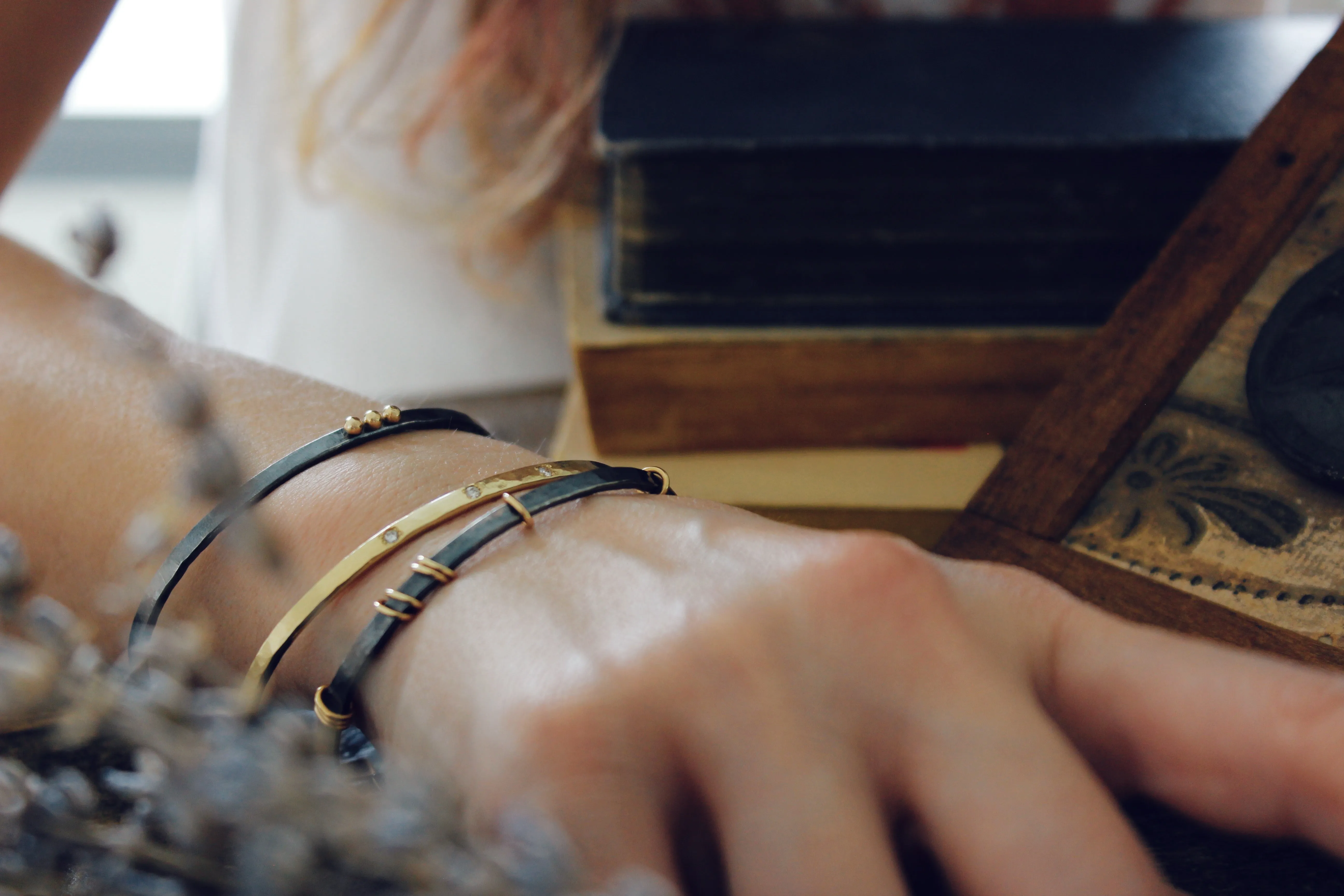 thin Oxidized sterling silver bracelet with five 14k gold