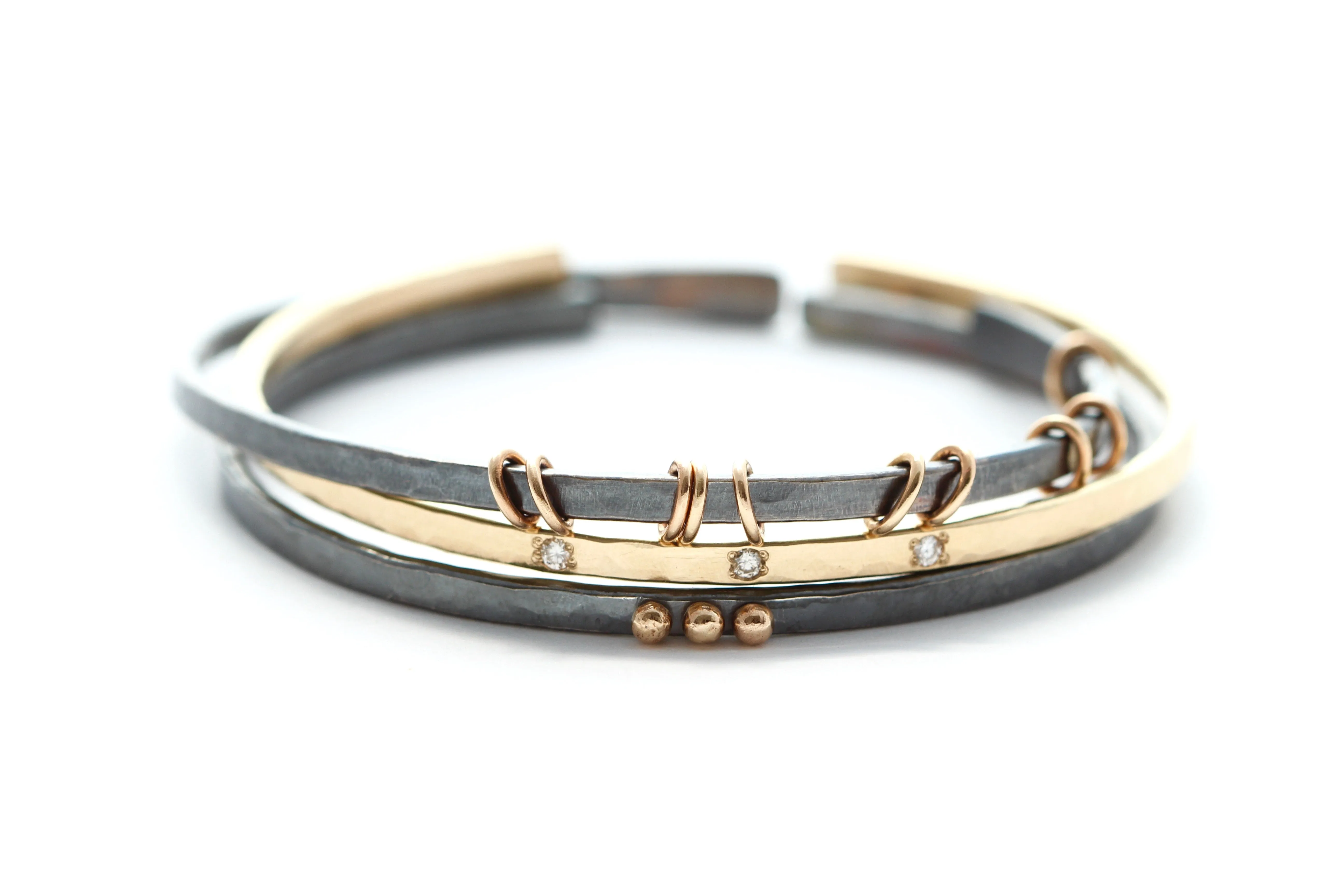 thin Oxidized sterling silver bracelet with five 14k gold