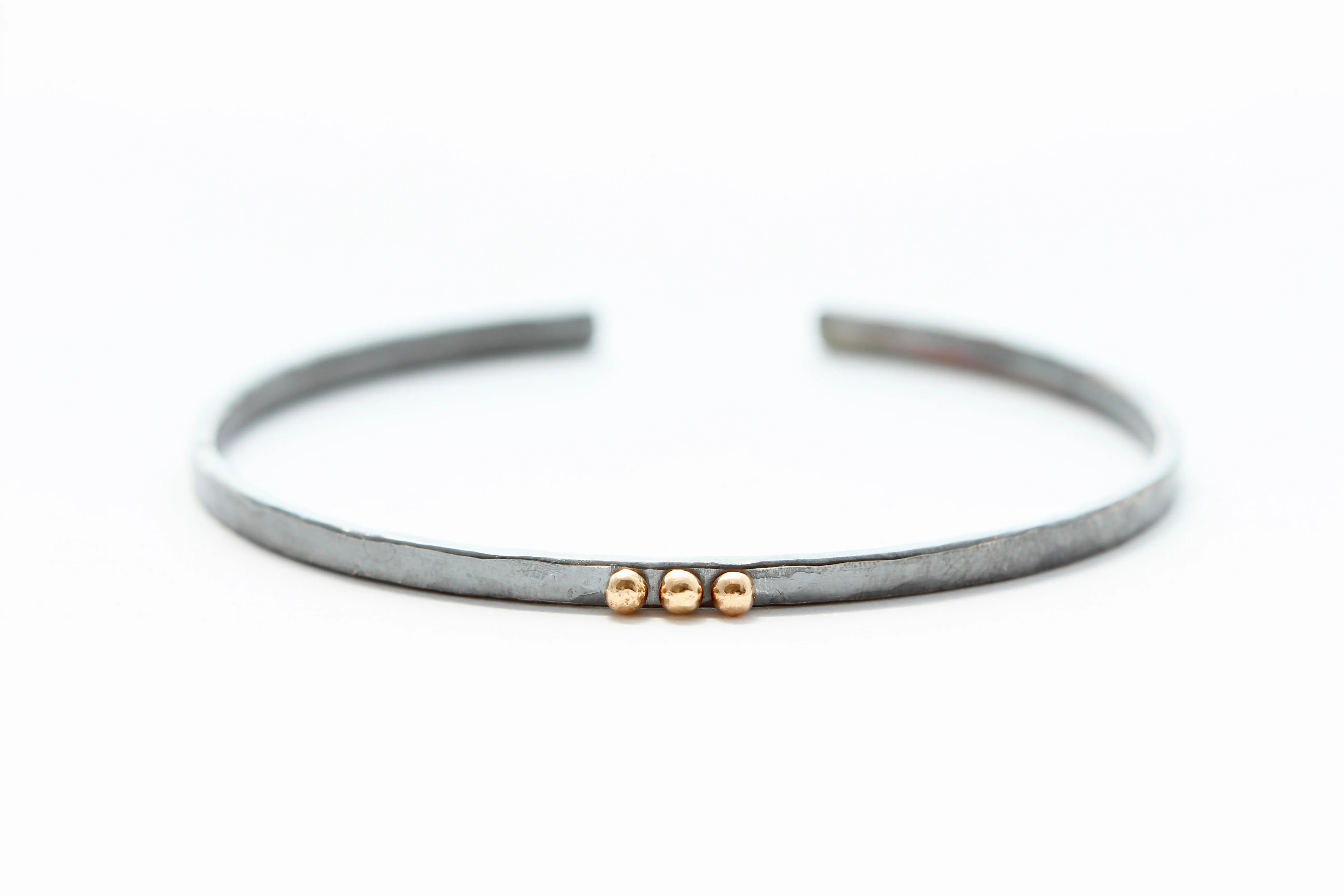 thin Oxidized sterling silver bracelet with five 14k gold