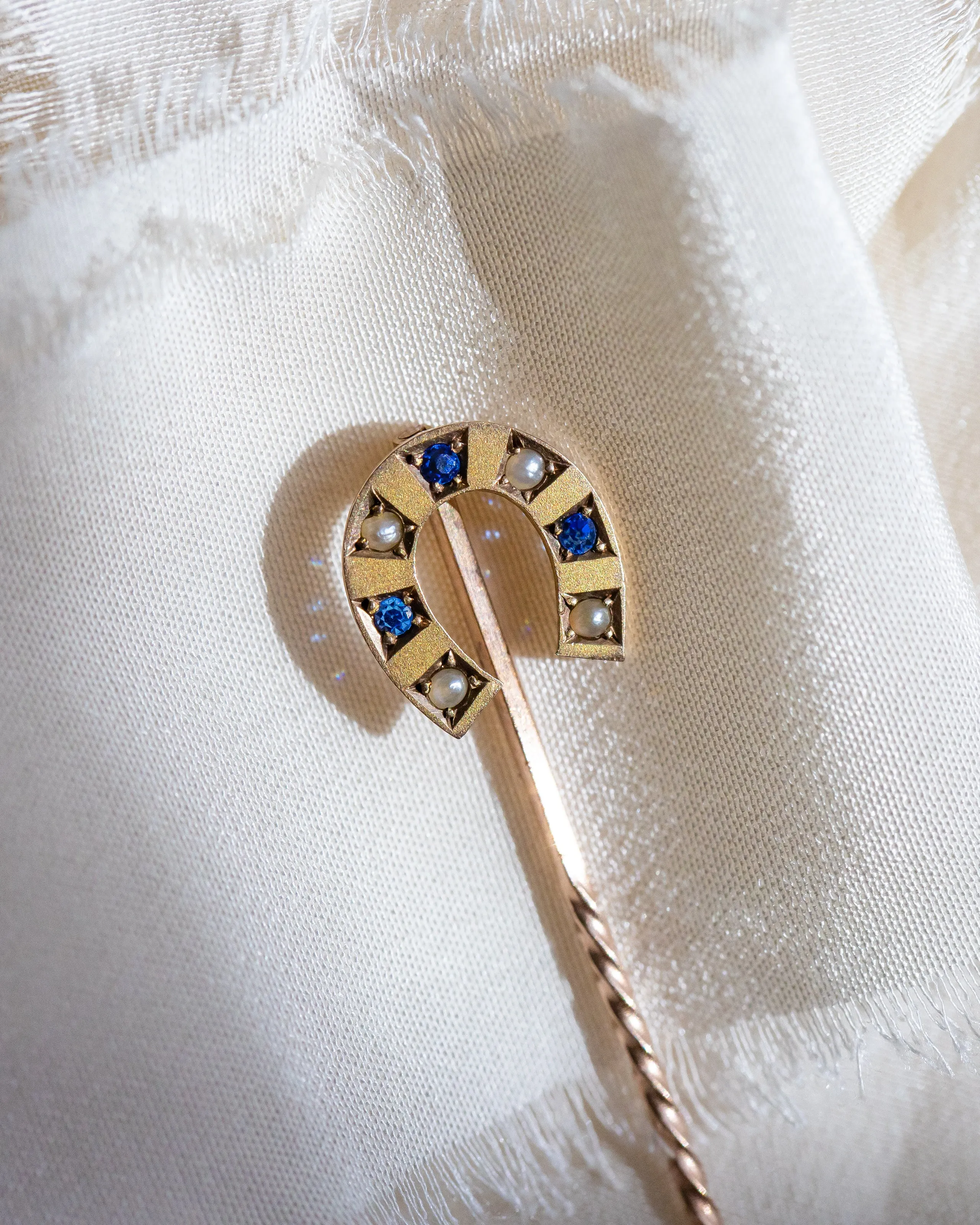 Victorian c. 1896 9k Bloomed Gold Sapphire Paste & Seed Pearl Horseshoe Stick Pin by William Walter Cashmore of Chester, UK