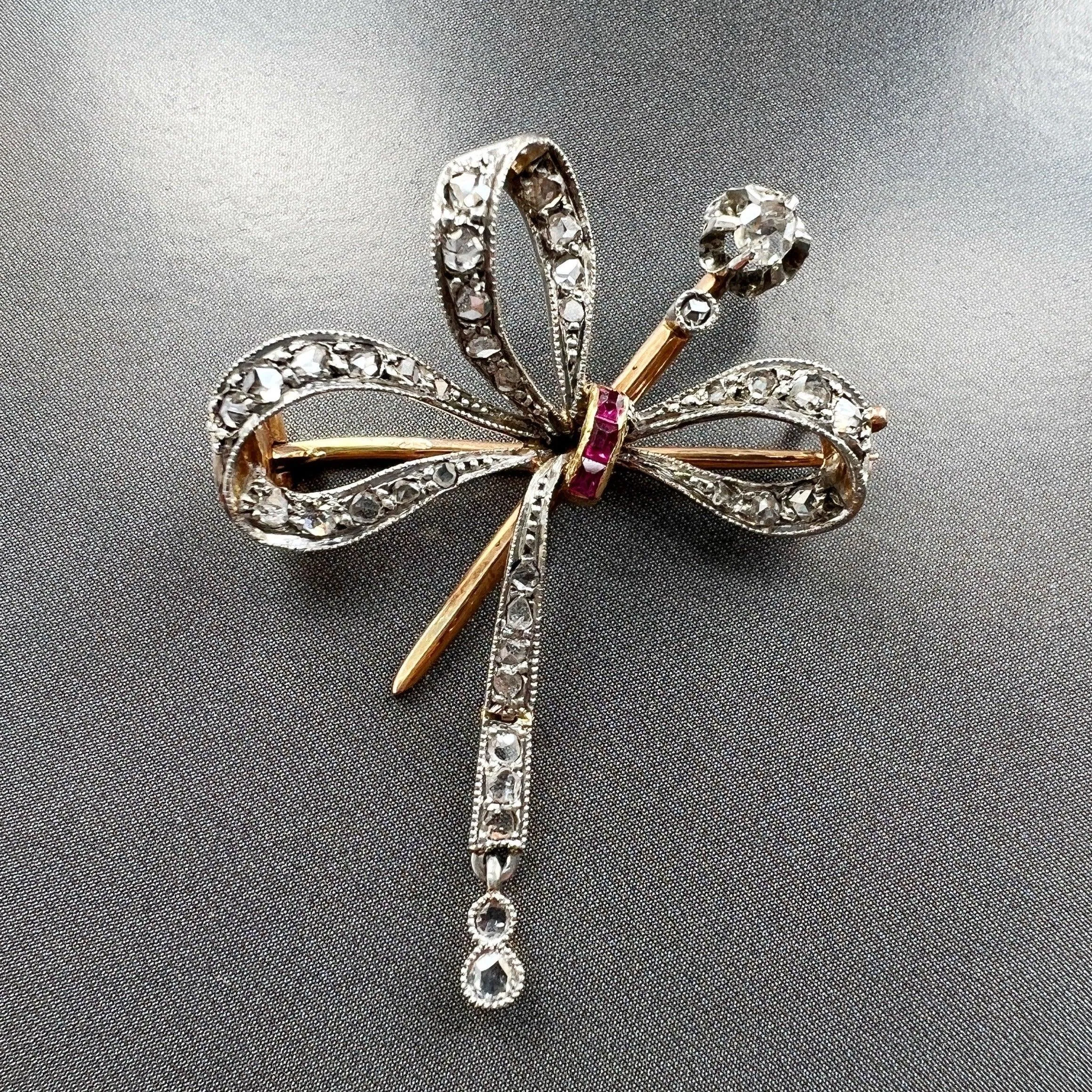 Victorian era 18K gold rose cut diamonds ruby articulated bow brooch