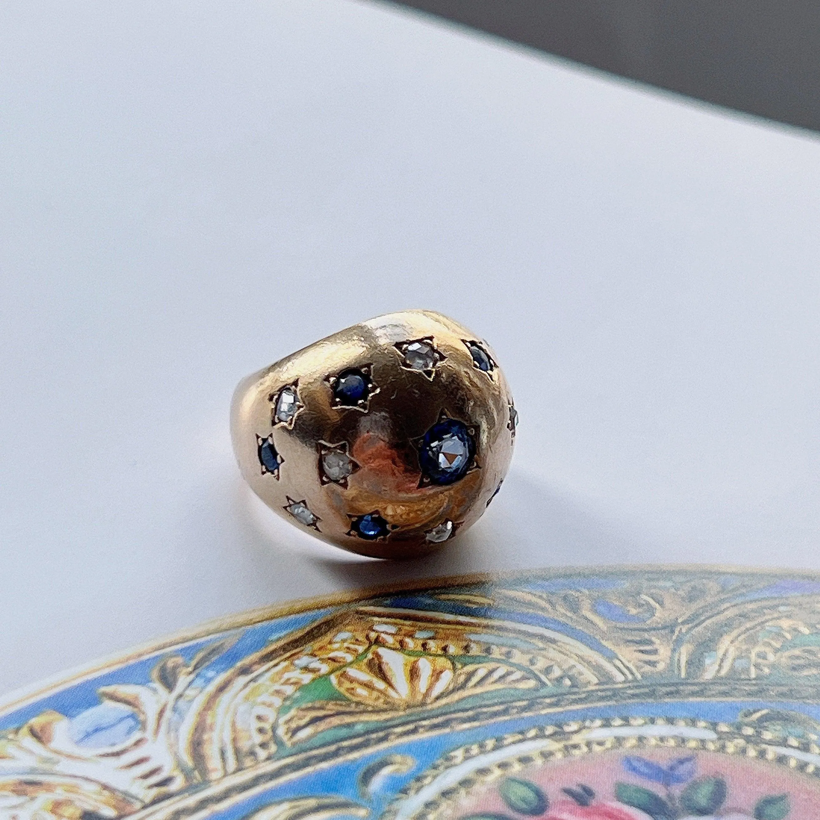 Vintage retro 18K gold blue sapphire diamond bombe star ring